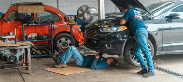 mechanic working under the car